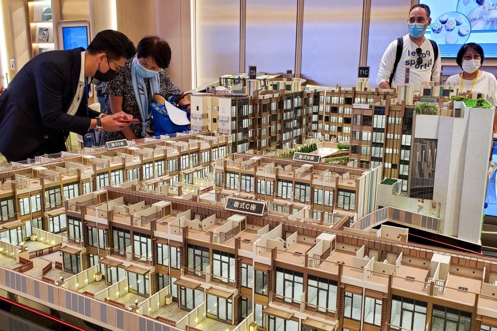 Potential buyers view a model of CK Asset’s #Lyos housing project during its launch in November 2021. A few buyers have forfeited their deposits for units in the project. Photo: Edmond So
