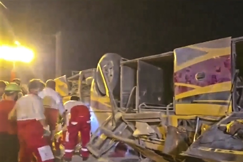 The aftermath of a bus crash near Taft, Iran, early on Wednesday. Photo: Iranian state television/AP