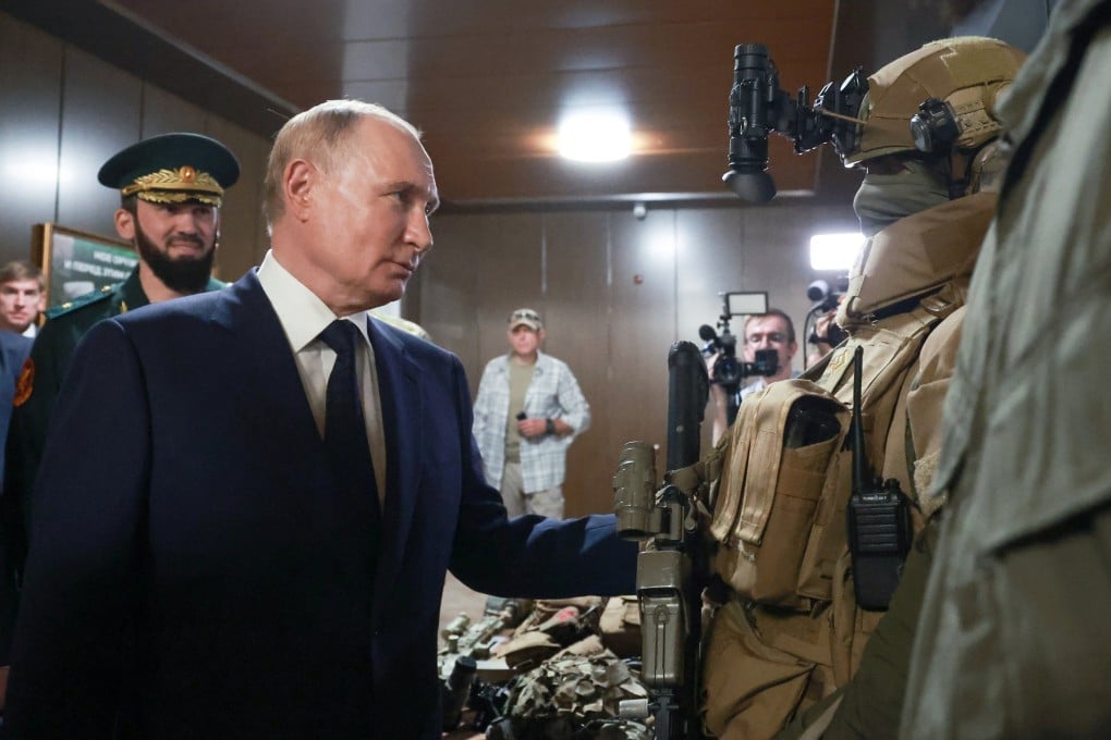 Vladimir Putin visits the Russian Special Forces University in Gudermes, Chechnya, on August 20. Photo: Sputnik via Reuters