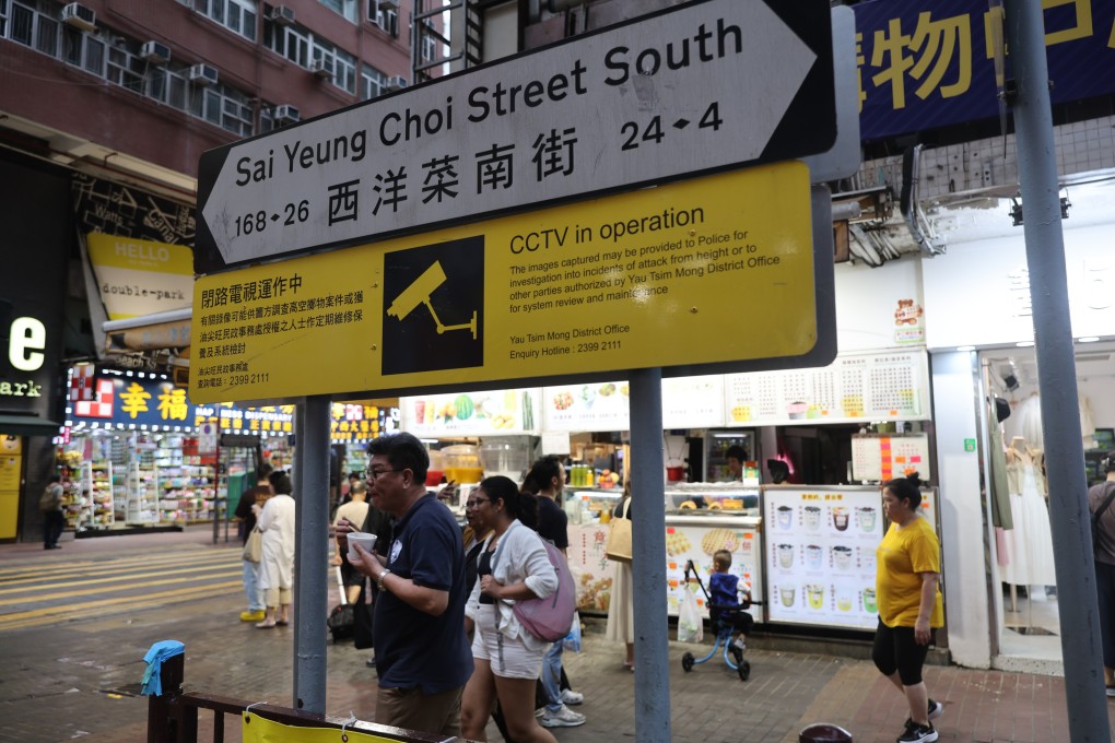 A sign reminds residents that CCTV cameras are in operation on Sai Yeung Choi Street South in Mong Kok. Photo: Edmond So