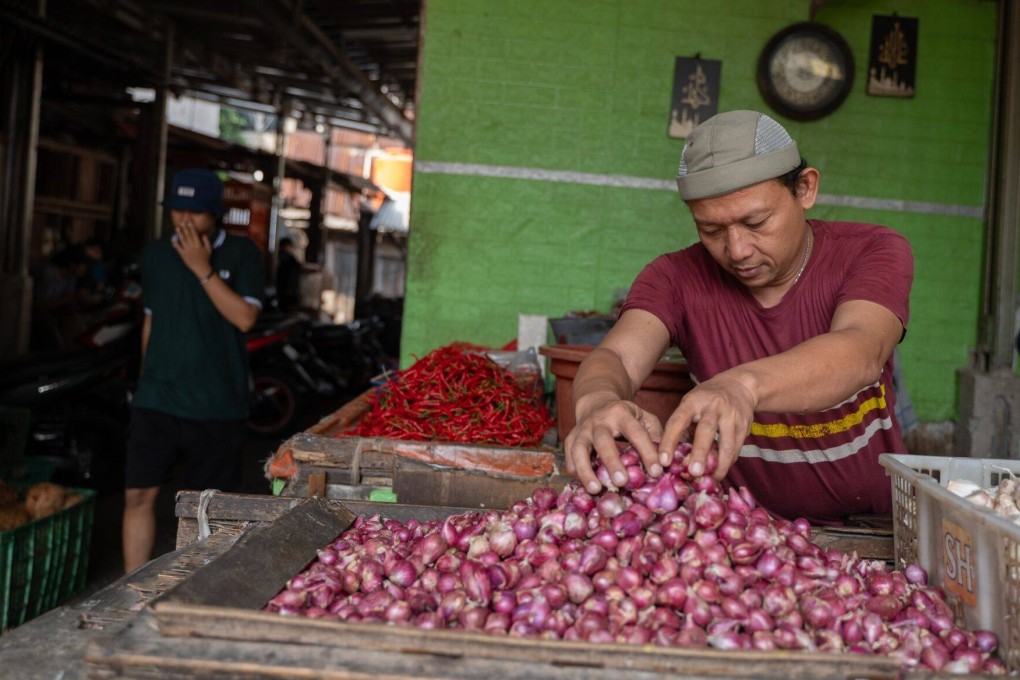 A vendor displays onions at Jatinegara market in Jakarta on July 31. Indonesia and other Southeast Asian countries could bolster their push for food security by including Australia and New Zealand in regional food-sharing mechanisms. Photo: Bloomberg