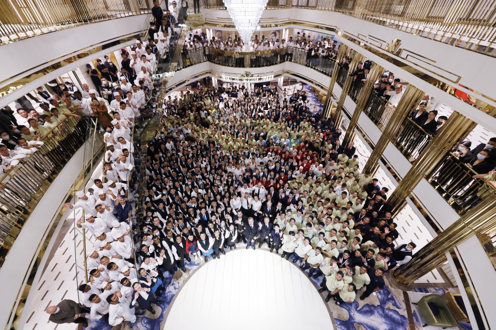 All the staff of the first domestically produced large-scale cruise ship, Adora Magic City. Photo: CNS