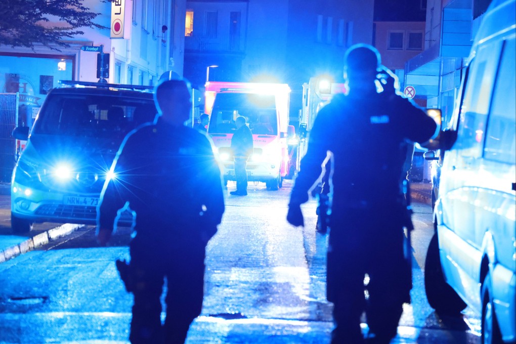 Police and ambulances are seen at the scene of the knife attack in the city of Solingen in Germany on Friday. Photo: dpa