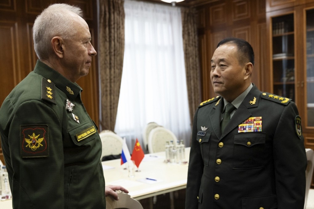 PLA Ground Forces Commander General Li Qiaoming with Russian Deputy Defence Minister Colonel General Alexander Fomin, in Moscow on Thursday. Photo: Handout via AP