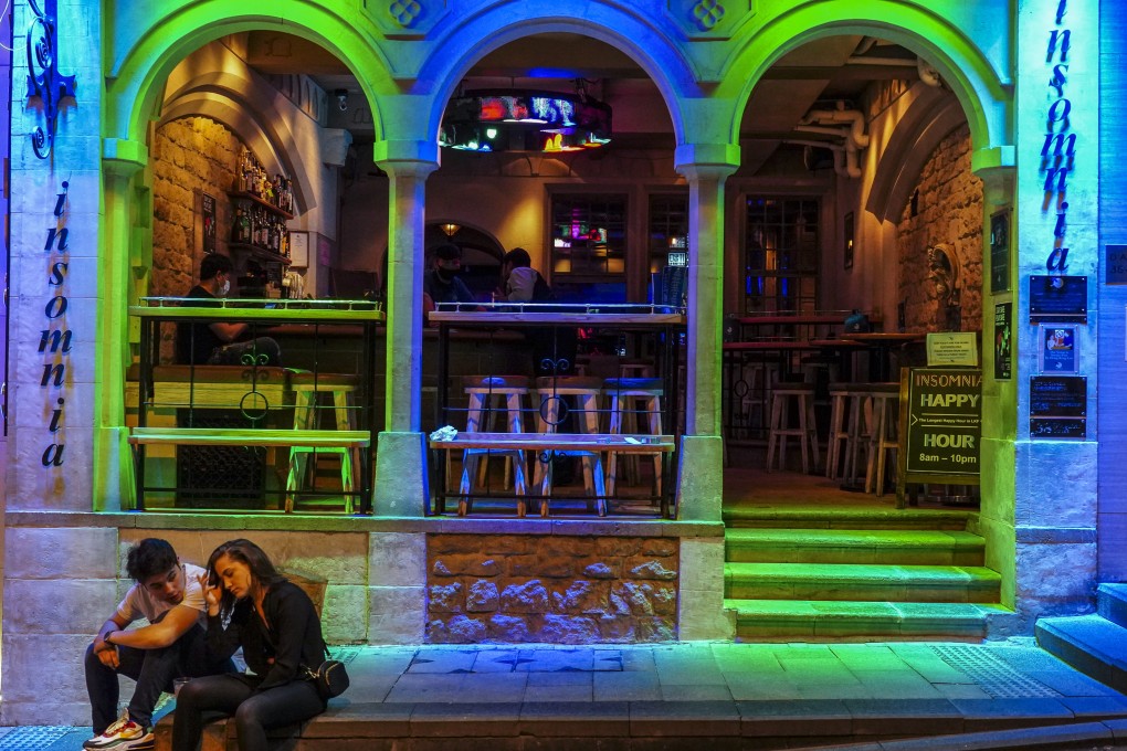 A quiet bar in Lan Kwai Fong, Central. The government has stopped accepting applications for the “Special 100% Loan Guarantee Scheme”. Photo: Robert Ng