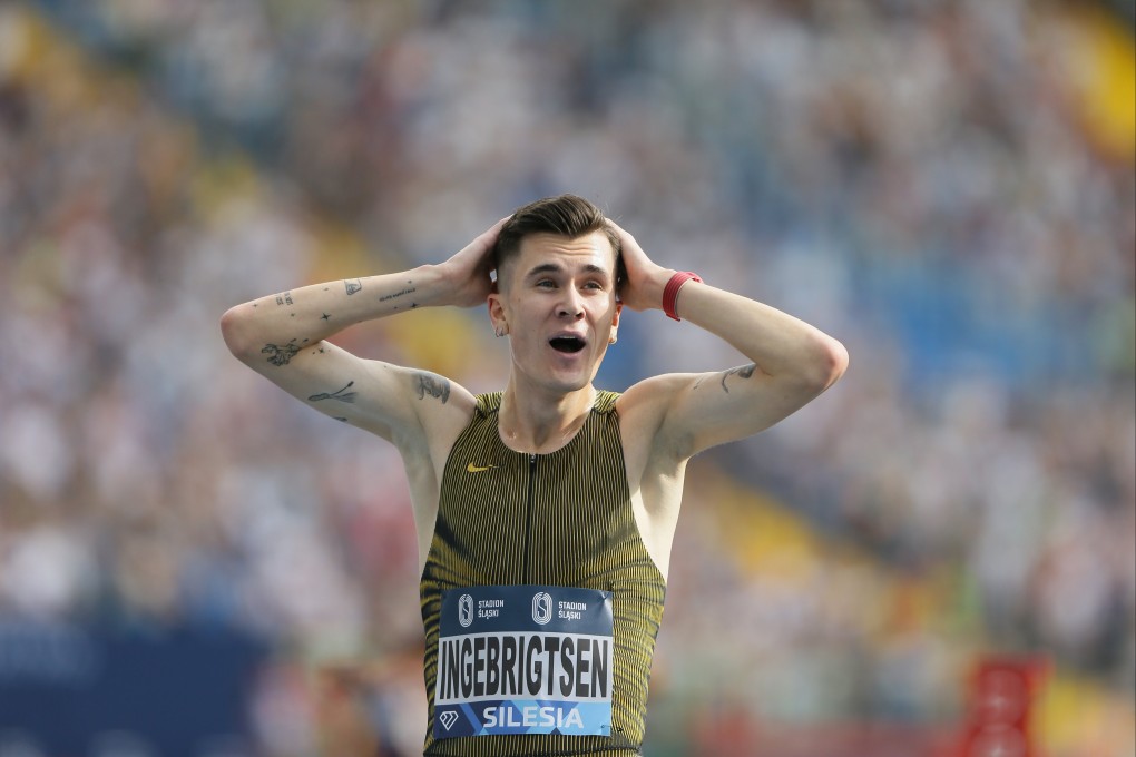 Jakob Ingebrigtsen takes a moment after realising he has set a 3,000m world record at the Silesia Diamond League. Photo: EPA-EFE