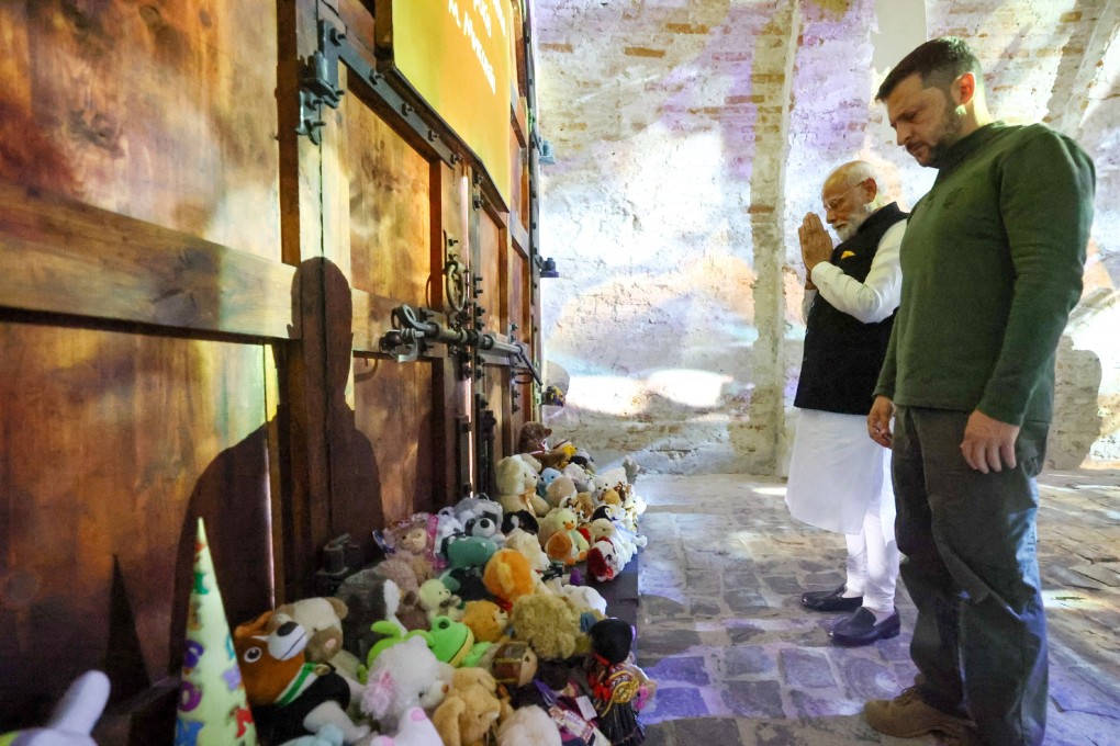 India’s Prime Minister Narendra Modi and Ukraine’s President Volodymyr Zelensky pay respects in Kyiv on Friday to the children killed amid Russia’s attack on Ukraine. Photo: India’s Press Information Bureau/Reuters