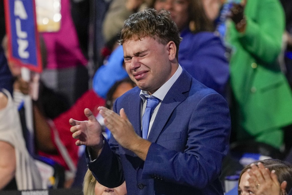 Gus Walz gets emotional as he applauds his father, Democratic vice-presidential nominee and Minnesota governor Tim Walz, during the Democratic National Convention in Chicago on August 21. Photo: AP