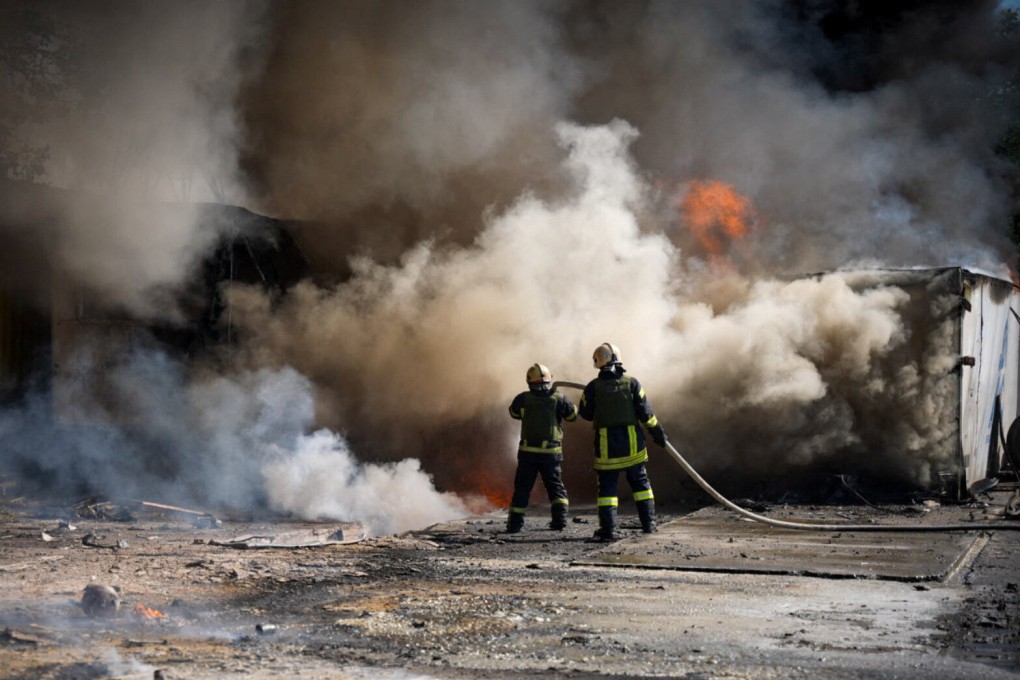 Firefighters work at the site of a Russian missile strike, amid Russia’s attack on Ukraine. Photo: Press service of the State Emergency Service of Ukraine in Odesa/Reuters