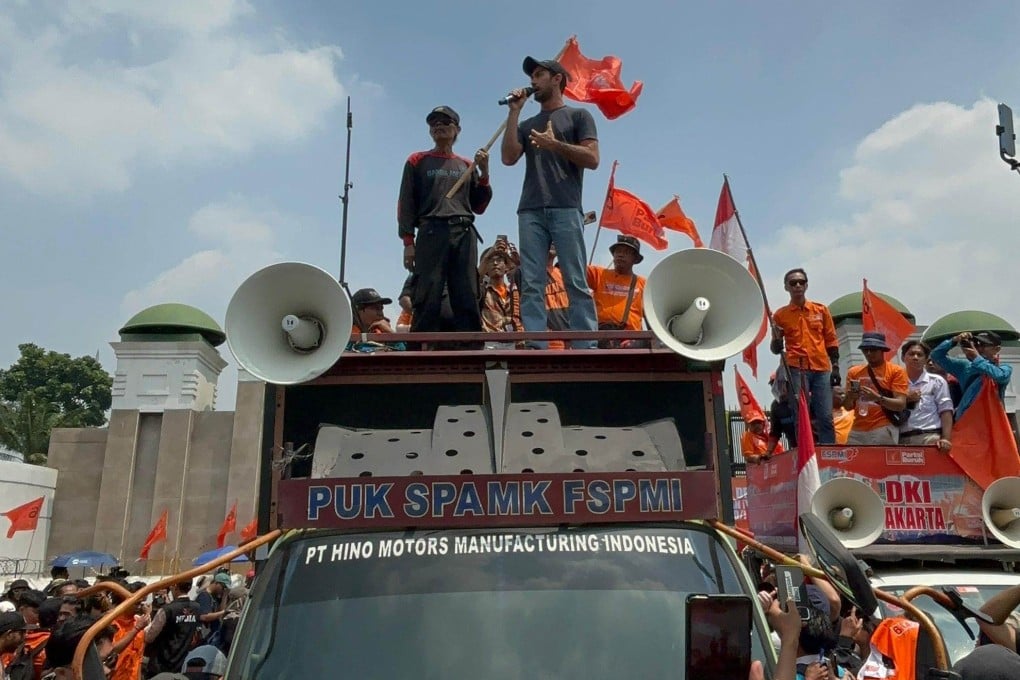 Indonesian celebrity Reza Rahadian addresses the crowds with an impromptu speech atop a truck at protests in Jakarta on Thursday last week. Photo: Arya Ibrahim