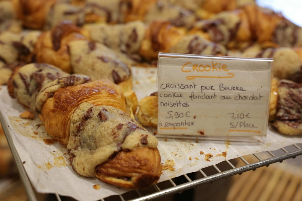 Crookies, a traditional French croissant mixed with cookie dough, in the pastry shop of French pastry chef Stephane Louvard in Paris, who is credited with inventing them. Along with the croffle and flat croissant, they have become trendy alternatives to the croissant. Photo: AFP