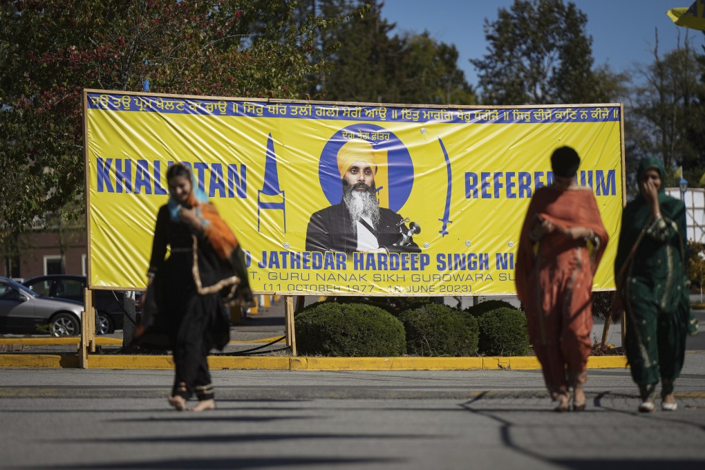 A photo of Hardeep Singh Nijjar on a banner outside the Guru Nanak Sikh Gurdwara Sahib in Surrey, British Columbia, Canada in 2023. On Tuesday, Canadian police issued a “duty to warn” notice to Nijjar’s aide Inderjeet Singh Gosal. Photo: The Canadian Press via AP