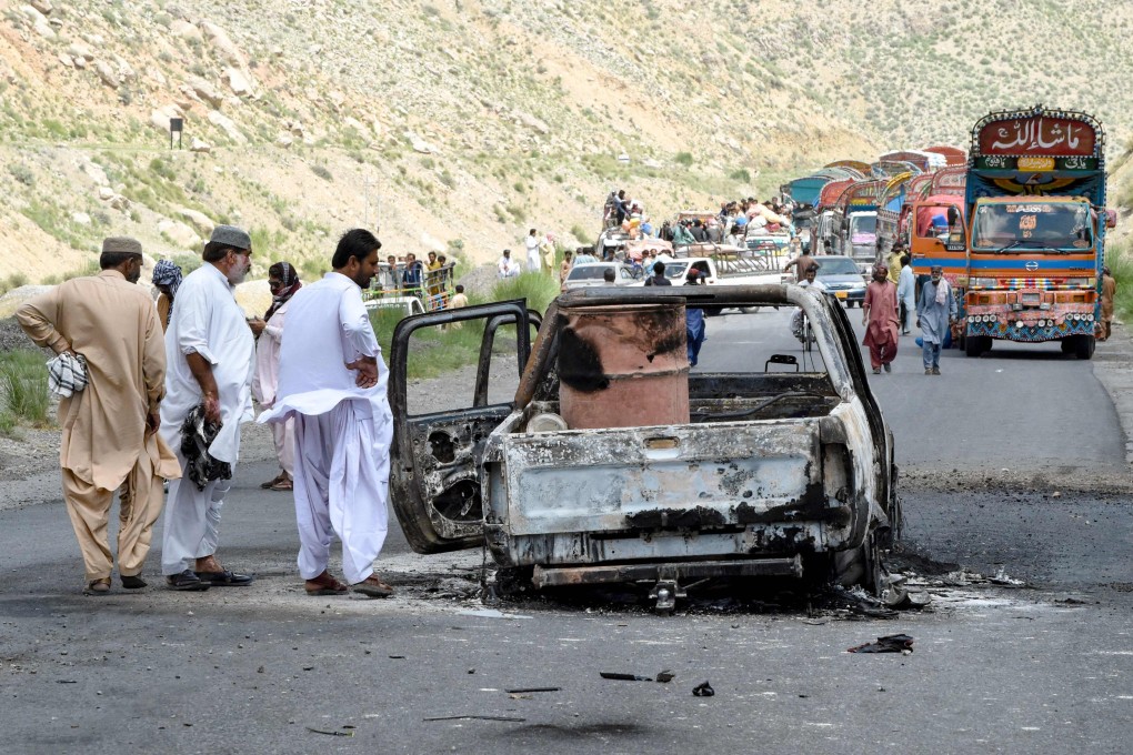 A charred vehicle after a blast by separatist militants at Kolpur, Balochistan province. Photo: AFP