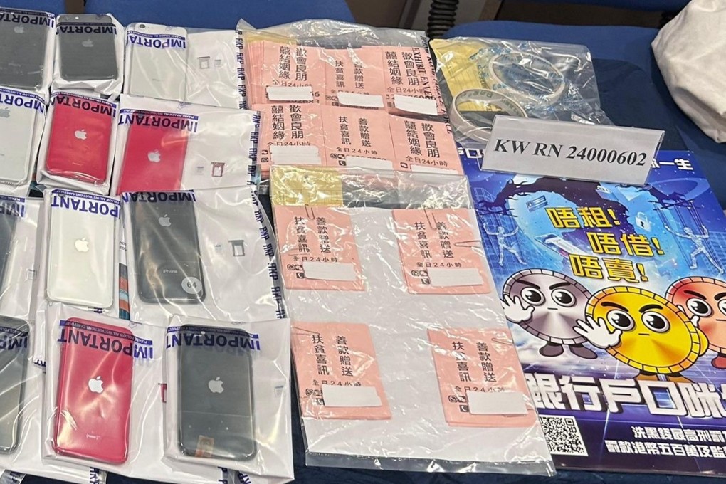 Hong Kong Police display items seized in a crackdown on a local racket offering fake poverty-relief payouts. Photo: Handout
