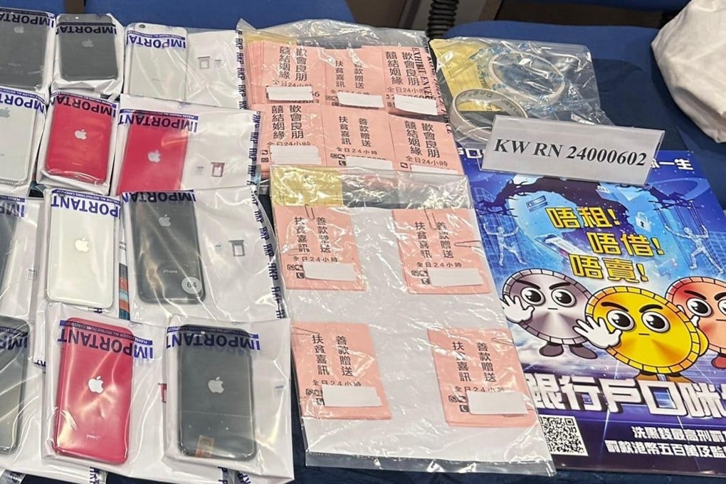 Hong Kong Police display items seized in a crackdown on a local racket offering fake poverty-relief payouts. Photo: Handout
