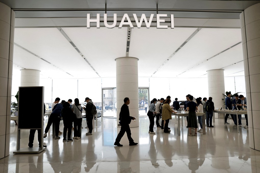 Customers shop at a the flagship Huawei store in Beijing after the Pura 70 series phones went on sale on April 18, 2024. Photo: Reuters