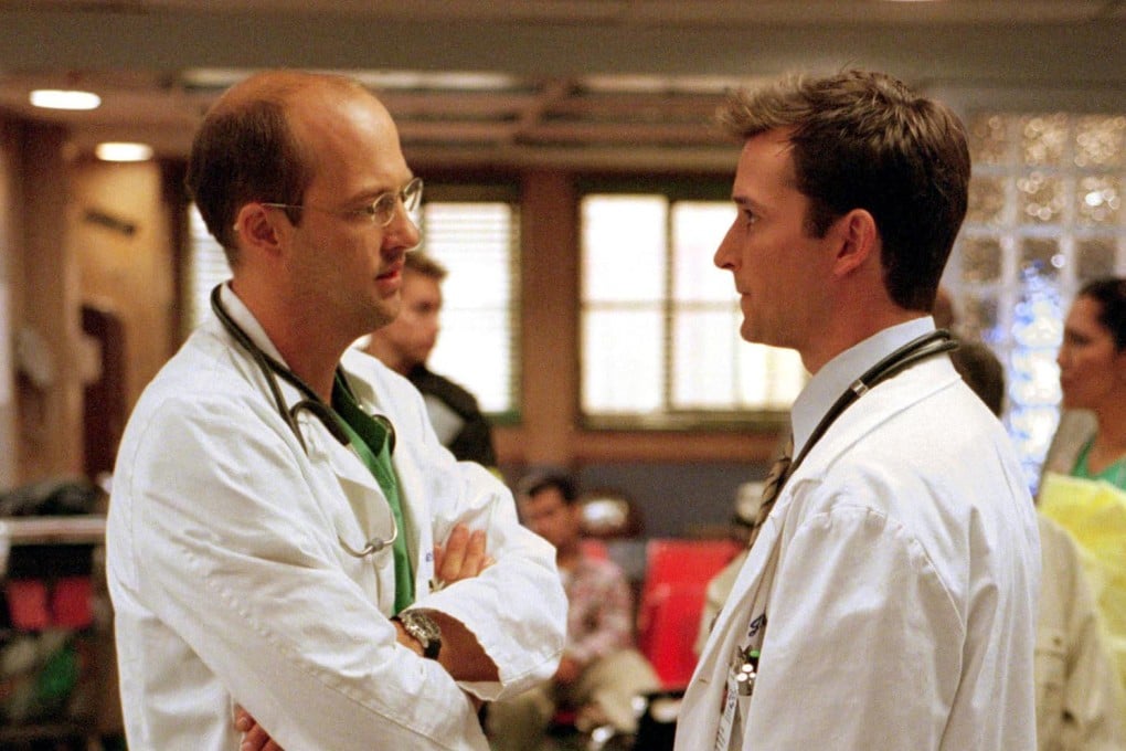 A scene from Michael Crichton creation ER with actors Anthony Edwards (left) and Noah Wyle. A lawsuit filed by Crichton’s estate against Warner Bros., alleging the studio is rebooting the TV series as The Pitt in breach of an agreement with the author, names Wyle as a co-defendant. Photo: Reuters