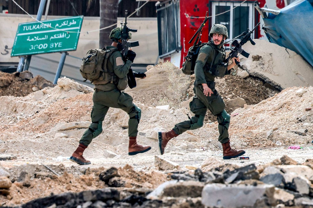 Israeli soldiers take position during an operation in Tulkarm, in the north of the occupied West Bank on Thursday. Photo: AFP