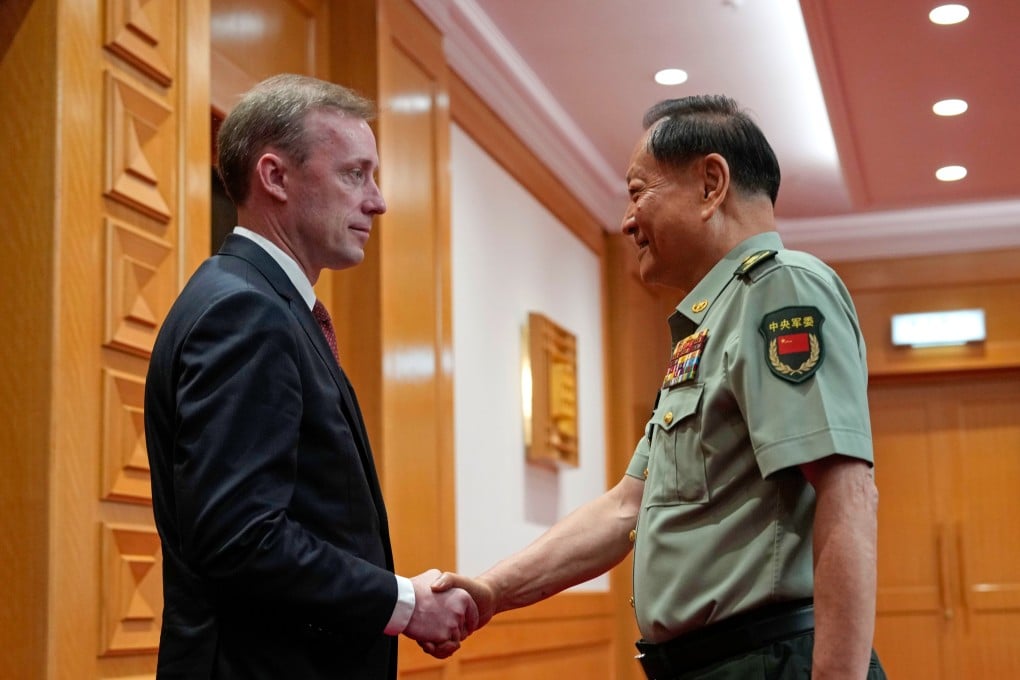 Zhang Youxia, vice-chairman of the CPC Central Military Commission, (right) shakes hands with White House national security adviser Jake Sullivan before a meeting at the Bayi building in Beijing on Thursday. Photo: AP