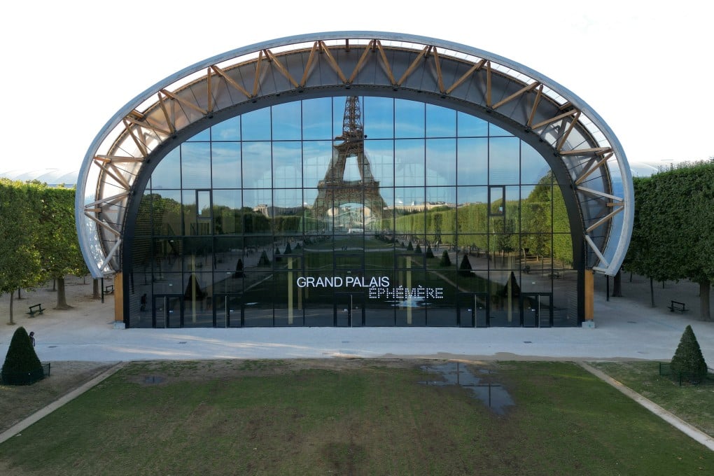The Eiffel Tower is reflected in the windows of the Grand Palais Ephemere, venue of the Champ-de-Mars Arena, where judo and wheelchair rugby are played. Photo: Reuters