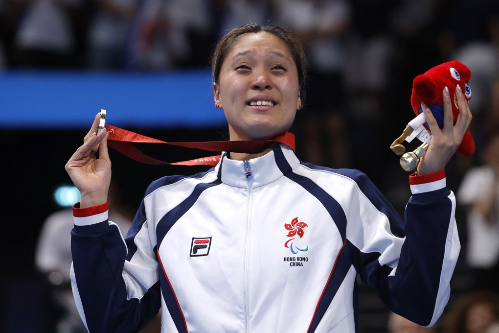 Chan Yui-lam is overcome with joy as she clinches a silver medal in the women’s 100 metres butterfly S14 at the Paris Paralympics. Photo: Reuters