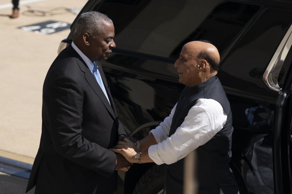 US Defence Secretary Lloyd Austin greets India’s Defence Minister Rajnath Singh before a meeting at the Pentagon on August 23. Photo: EPA-EFE