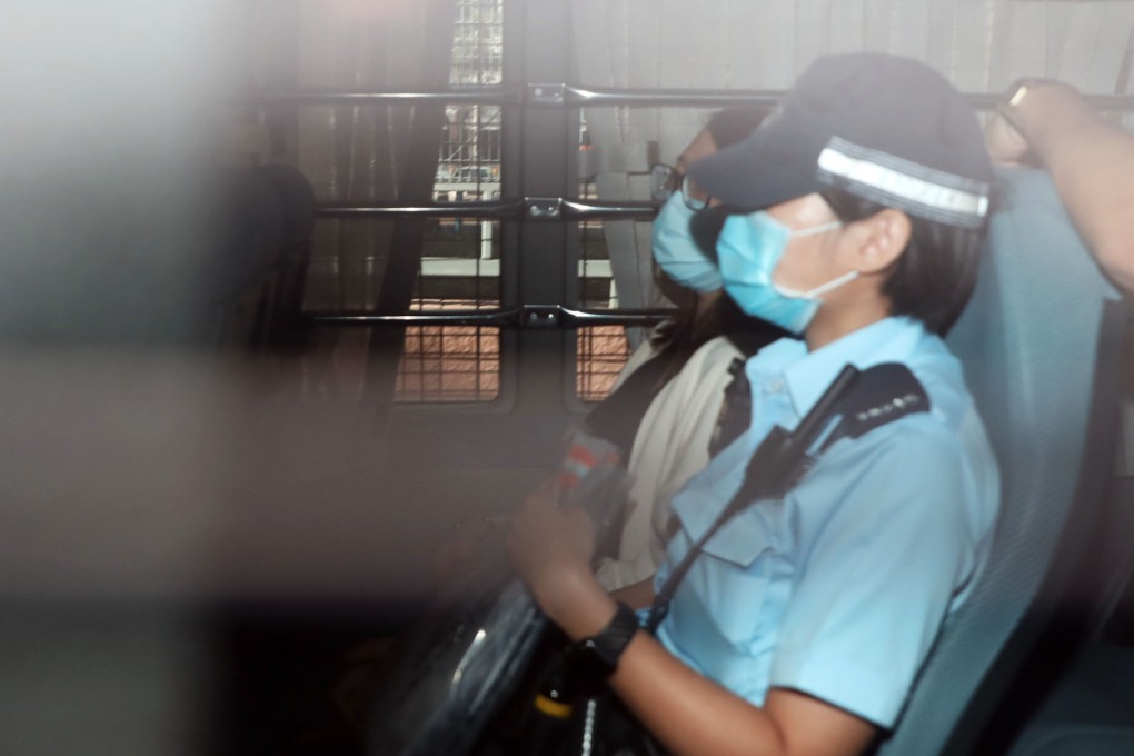 Chung Suet-ying is escorted to the Fanling Court. She was charged over one count of possession of arms or ammunition without licence. Photo: K. Y. Cheng