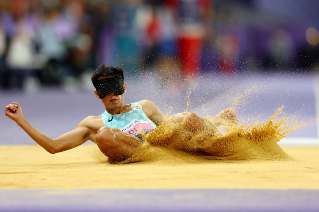 Di Dongdong won gold in the men’s T11 long jump with a world record leap of 6.85m. Photo: Reuters