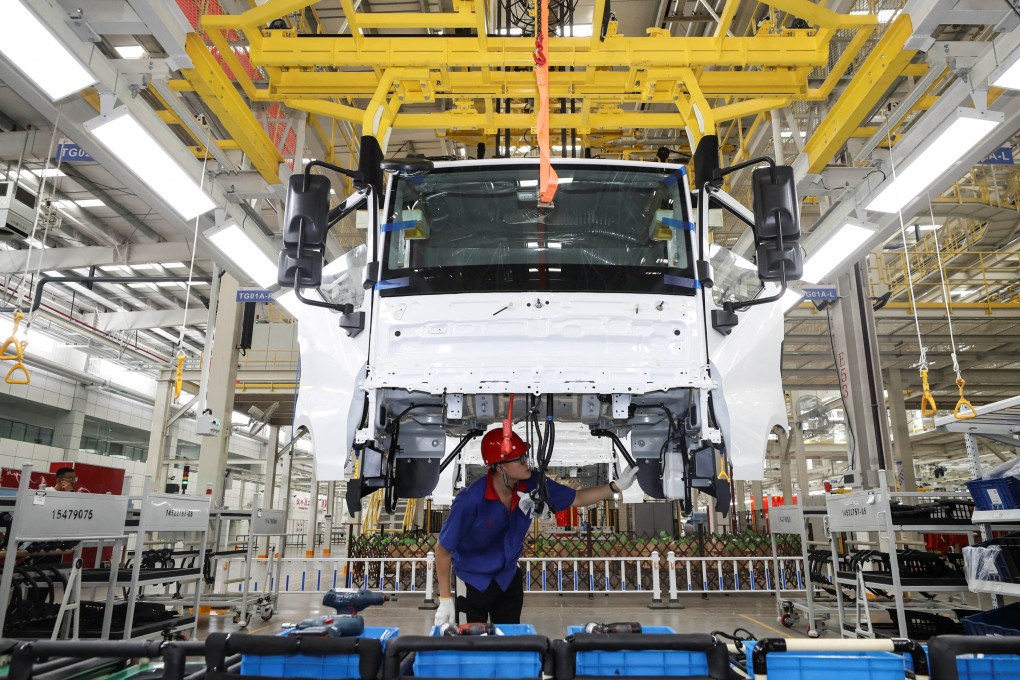 An employee works on a new energy vehicle production line at a BYD factory in Huaian, Jiangsu province. Photo: Reuters