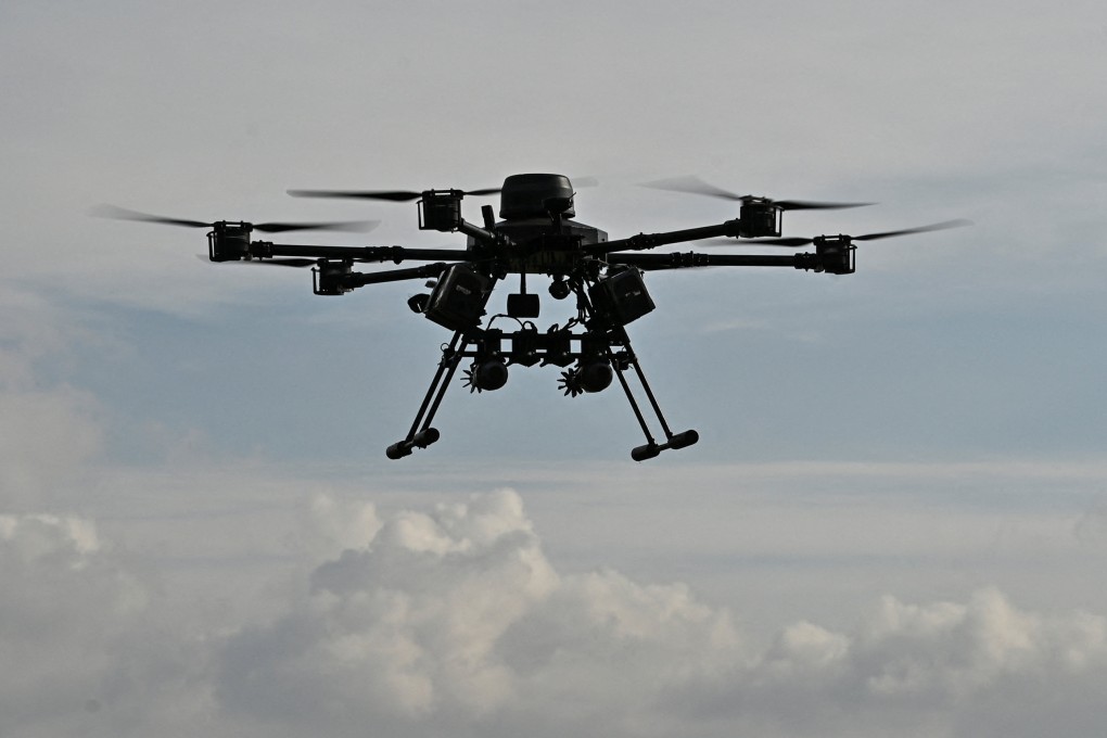 A Ukrainian Vampire unmanned aerial vehicle with attached mortar shells is seen in the air near a front line amid Russia’s attack on Ukraine. Photo: Reuters