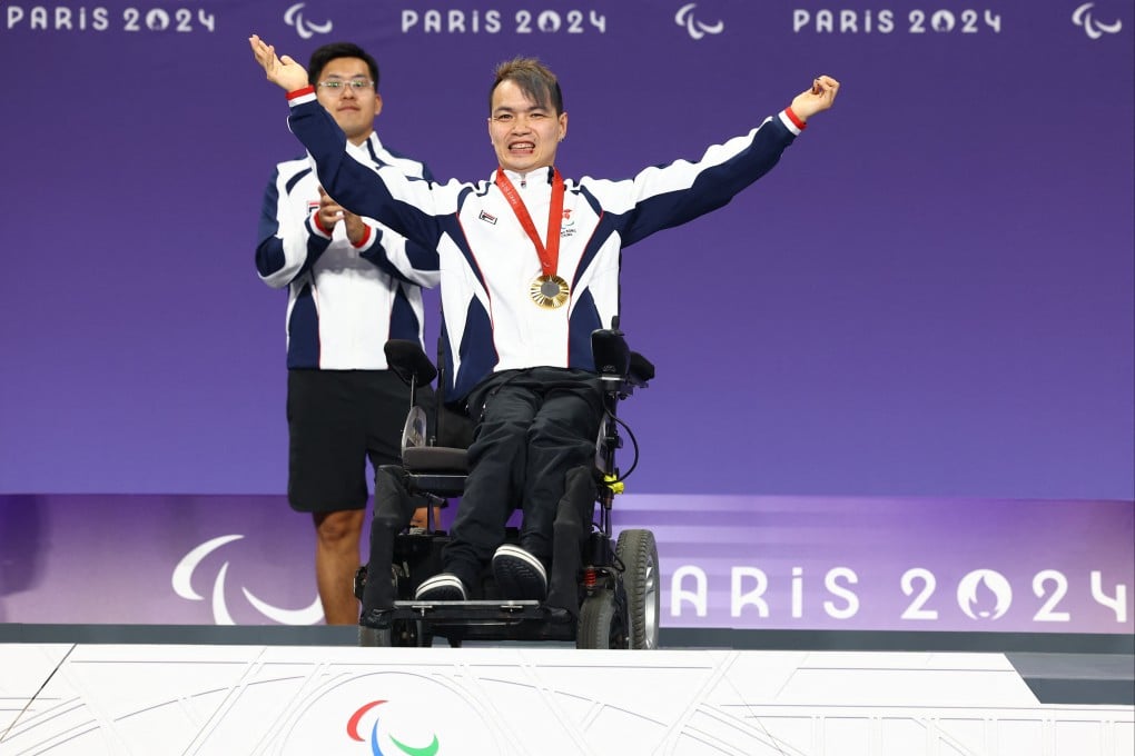 Hong Kong’s gold medallist John Loung celebrates. Photo: Reuters