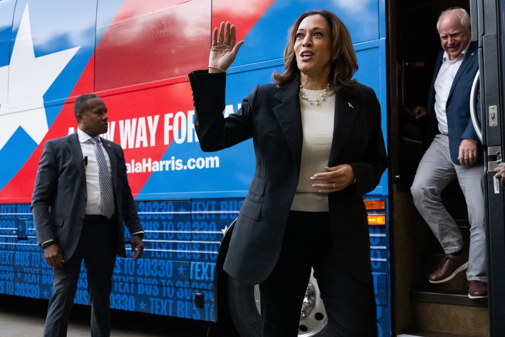 Democratic presidential candidate US Vice-President Kamala Harris and her running mate, Minnesota Governor Tim Walz, leave their campaign bus in Savannah, Georgia, on August 28. Photo: TNS