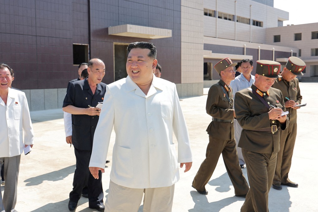 North Korean leader Kim Jong-un visits a construction site at an undisclosed location in North Korea at the weekend. Photo:   KCNA via Reuters