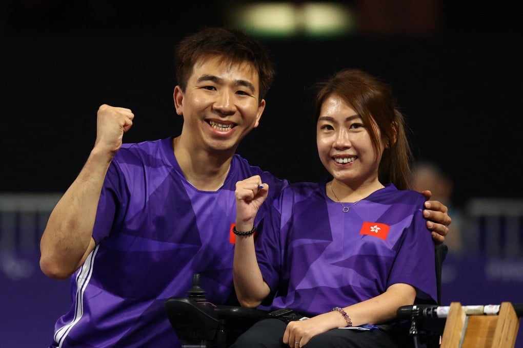 Hong Kong’s Ho Yuen-kei and husband Lee Wing-kit celebrate winning gold at the Paris Paralympics. Photo: Reuters