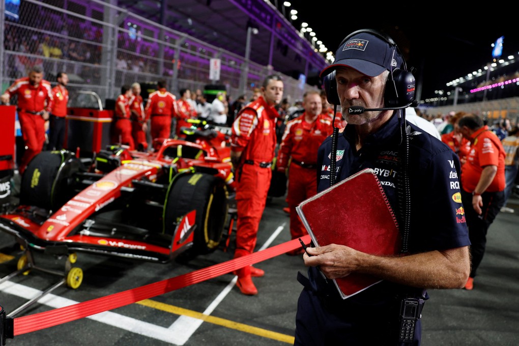 Formula One F1 - Saudi Arabian Grand Prix - Jeddah Corniche Circuit, Jeddah, Saudi Arabia - March 9, 2024 
Red Bull’s chief technology officer Adrian Newey with Ferrari engineers and Carlos Sainz Jr’s car before the 2024 Saudi Arabian Grand Prix. Photo: Reuters