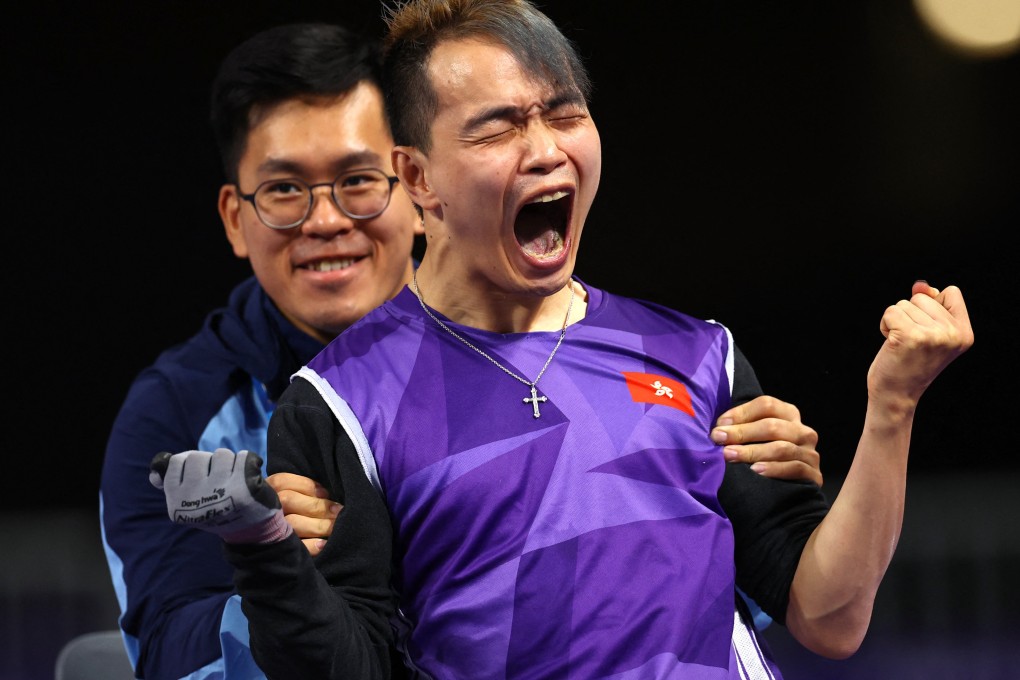 John Loung of Hong Kong celebrates after winning gold against Jung Sungjoon of South Korea. Photo: Reuters