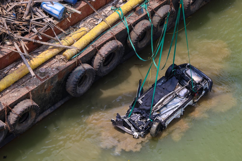 The car was recovered from the waters beneath the bridge shortly after midday on Tuesday. Photo: Jelly Tse