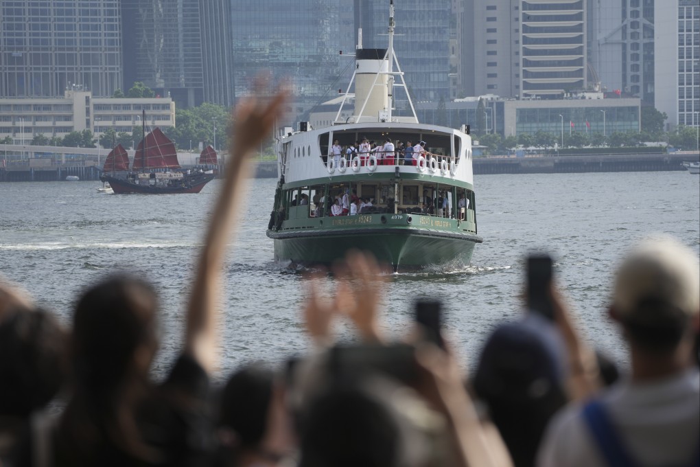 The mainland Chinese Olympic delegation visits Victoria Harbour on August 30. Photo: Sam Tsang