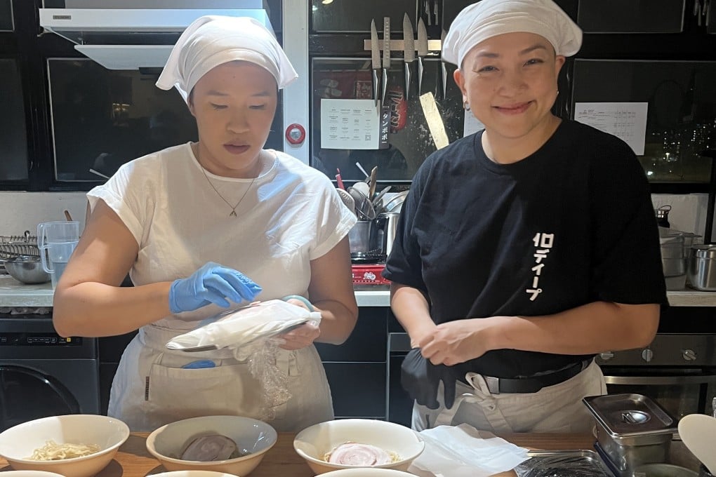 Amanda Kwan and Alison Tan prepare the first course for Savour Cinema’s screening of Tampopo. At Savour Cinema, food and drink related to the story are served as film-goers watch the action. Photo: Charmaine Mok