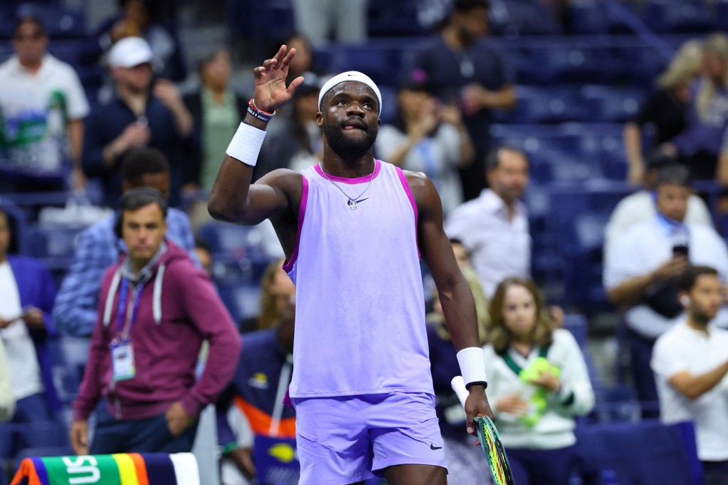 Frances Tiafoe of the US in muted celebration after winning his quarter-final match against Grigor Dimitrov, who retired hurt in the fourth set. Photo: Reuters