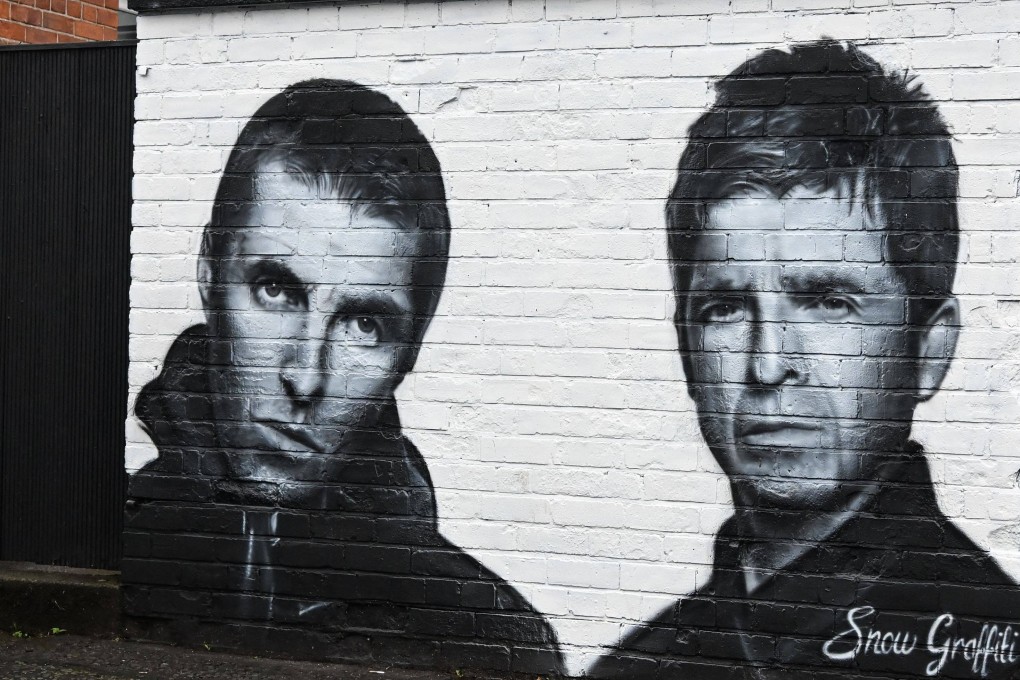 A mural depicting the Gallagher brothers of Oasis at a pub in Manchester, England. The band split in 2009 but recently reunited for a UK tour. Photos: AFP.