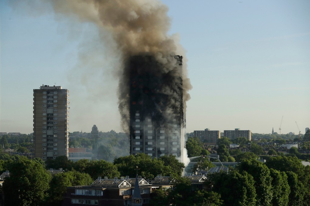 Smoke rises from Grenfell Tower in London in 2017. Photo: AP