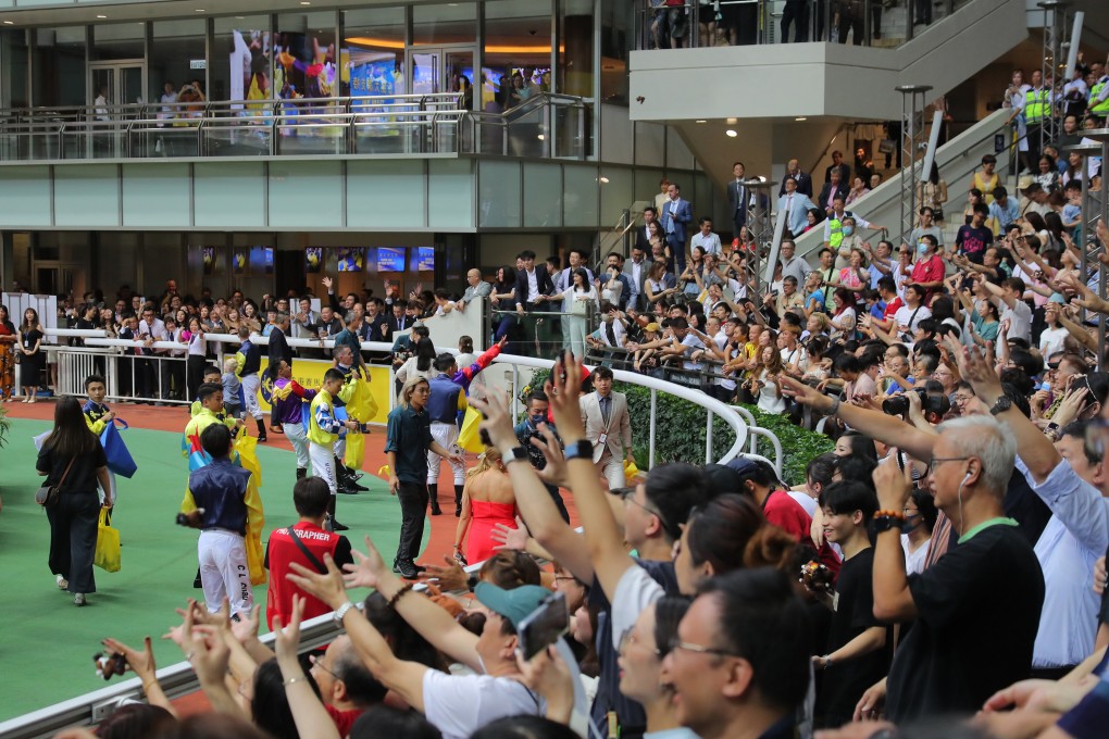 Jockeys gather before punters at the Sha Tin Racecourse. The Jockey Club said it faced significant external challenges during the financial year, including rising competition from Macau’s casinos. Photo: Kenneth Chan.