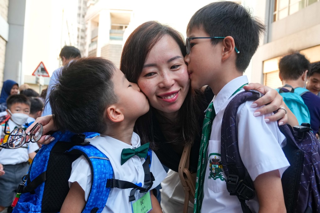 Students return to school on the first day of the academic year at St Joseph Primary School in Wan Chai. Photo: Sam Tsang