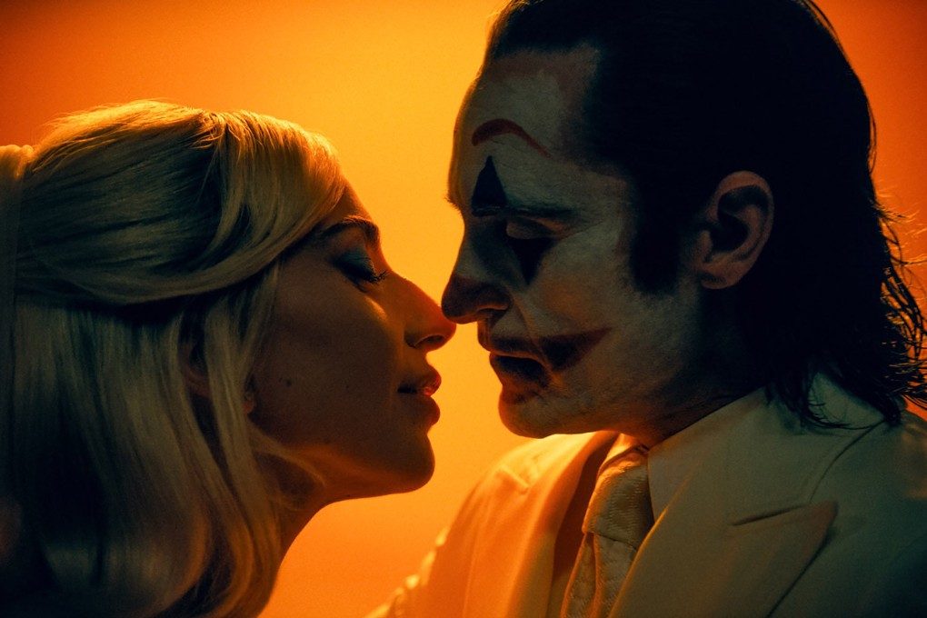 Lady Gaga (left) and Joacquin Phoenix in a still from Joker: Folie à Deux. Photo: Niko Tavernise/Warner Bros. Entertainment Inc.