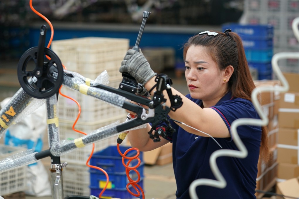 A worker is seen at a children’s wheels factory in Pingxiang County in northern China’s Hebei province. Photo: Xinhua