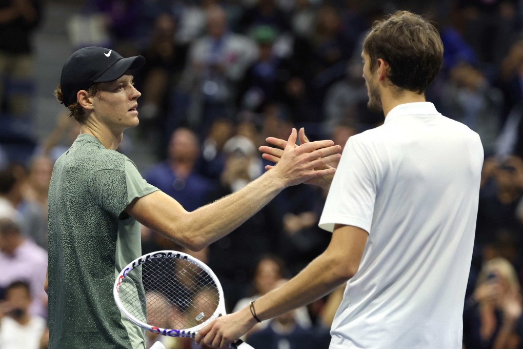 Jannik Sinner of Italy shakes hands with Daniil Medvedev of Russia after winning their quarter-final match at Flushing Meadows on Wednesday. Photo: AFP