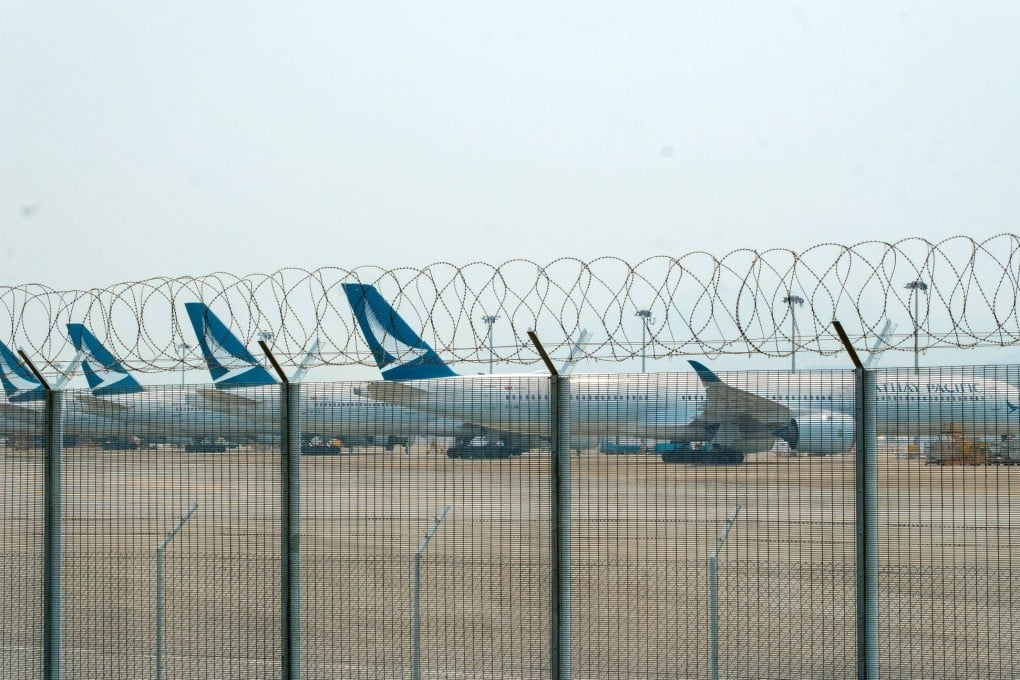 Airbus A350 aircraft operated by Cathay Pacific parked on the tarmac at Hong Kong airport. Photo: Bloomberg