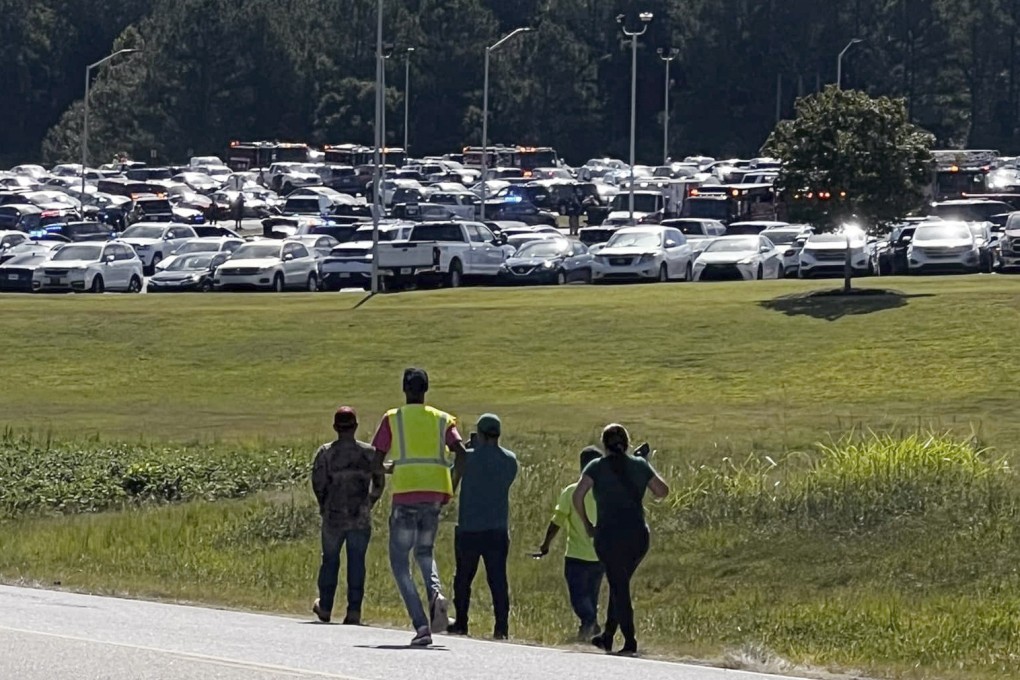 Students are evacuated to the football stadium at Apalachee High School in Winder, Georgia, on Wednesday. Photo: Erin Clark via AP