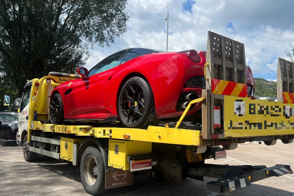 The red Ferrari is impounded by police after the driver’s arrest on Thursday afternoon. Photo: SCMP